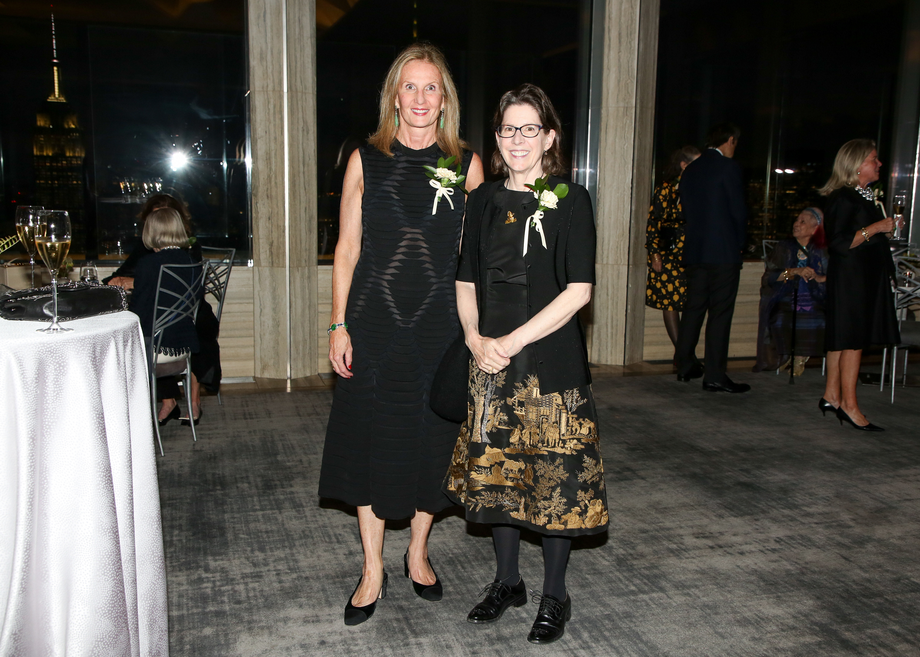 Trustee Susan Dunne and Gala Host Migs Wright pose for a photograph during the gala