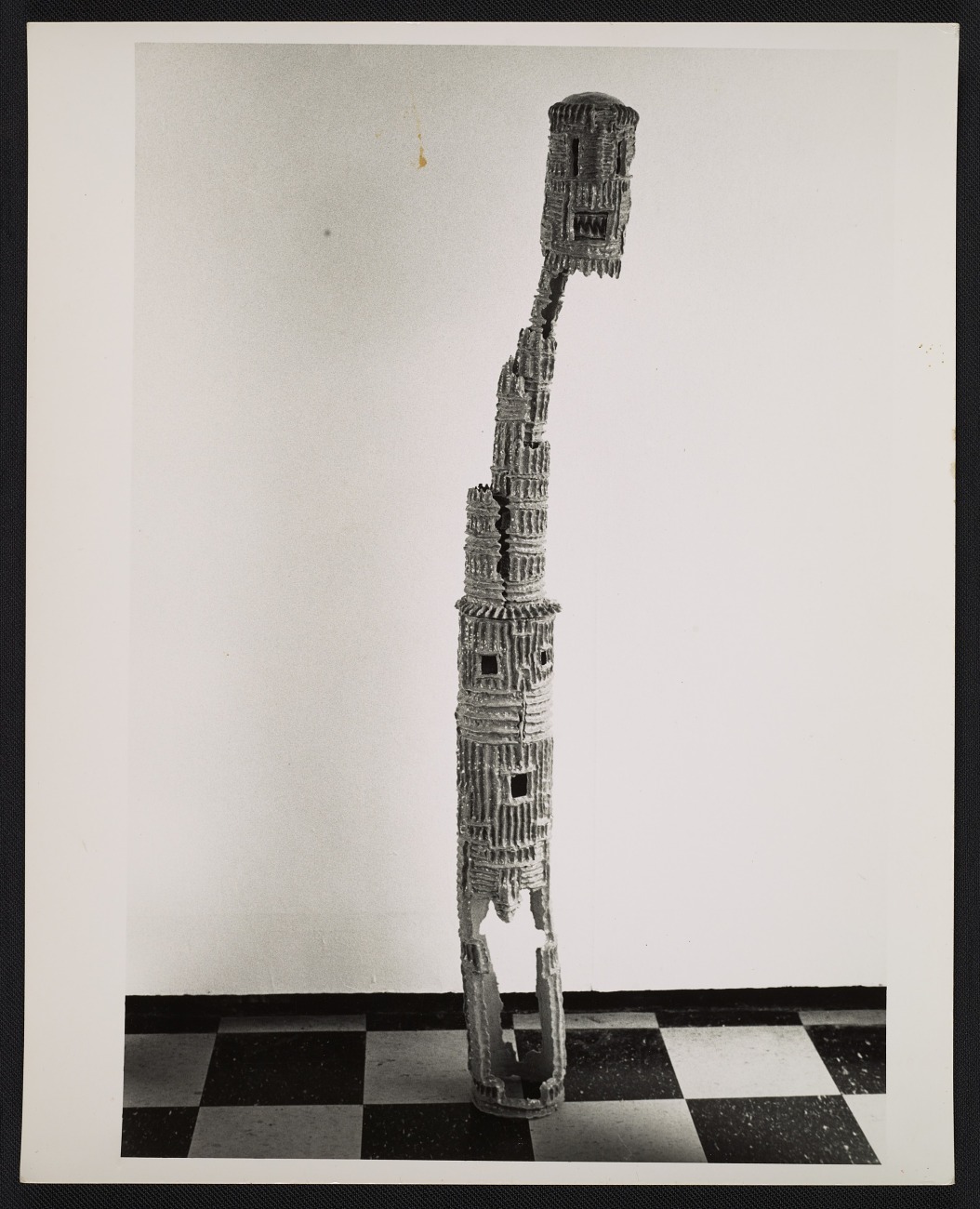 Black and white photograph of Jerome Caja's sculpture "Earthquake detector" which resembles a concrete tower