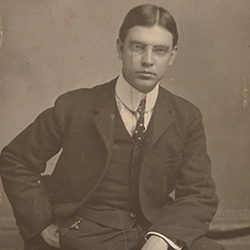 Photo is a portrait of Frederick Carl Frieseke seated.