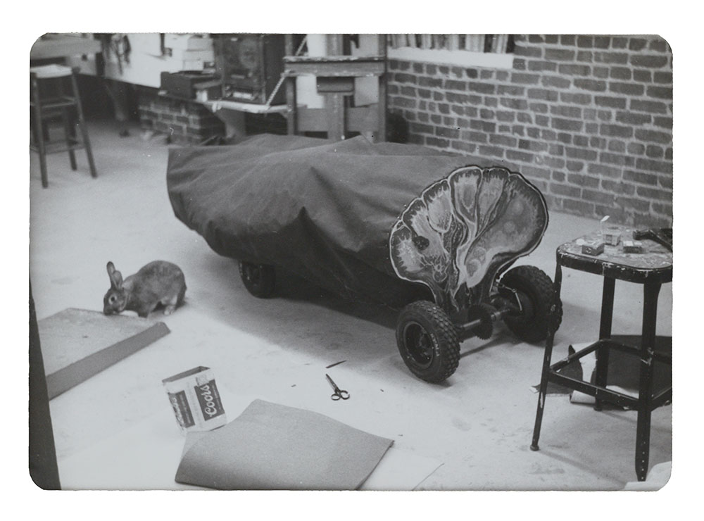 Photograph of Tongue-tied, Artists' Soap Box Derby car by Eleanor Dickinson, 1975 / unidentified photographer. Eleanor Dickinson papers, 1951-2003. Archives of American Art, Smithsonian Institution. Image of Eleanor Dickinson Artists' Soap Box Derby Car, Tongue-tied