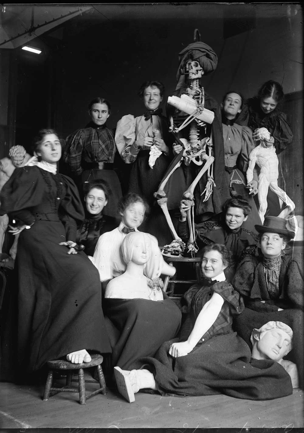 Art class posing with a skeleton