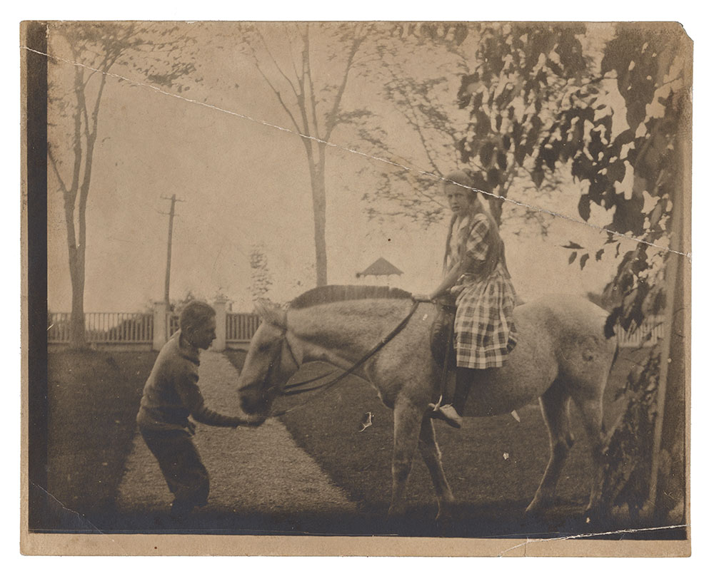 Photograph of the staging for Edmund C. Tarbell's painting, Going for a Ride.