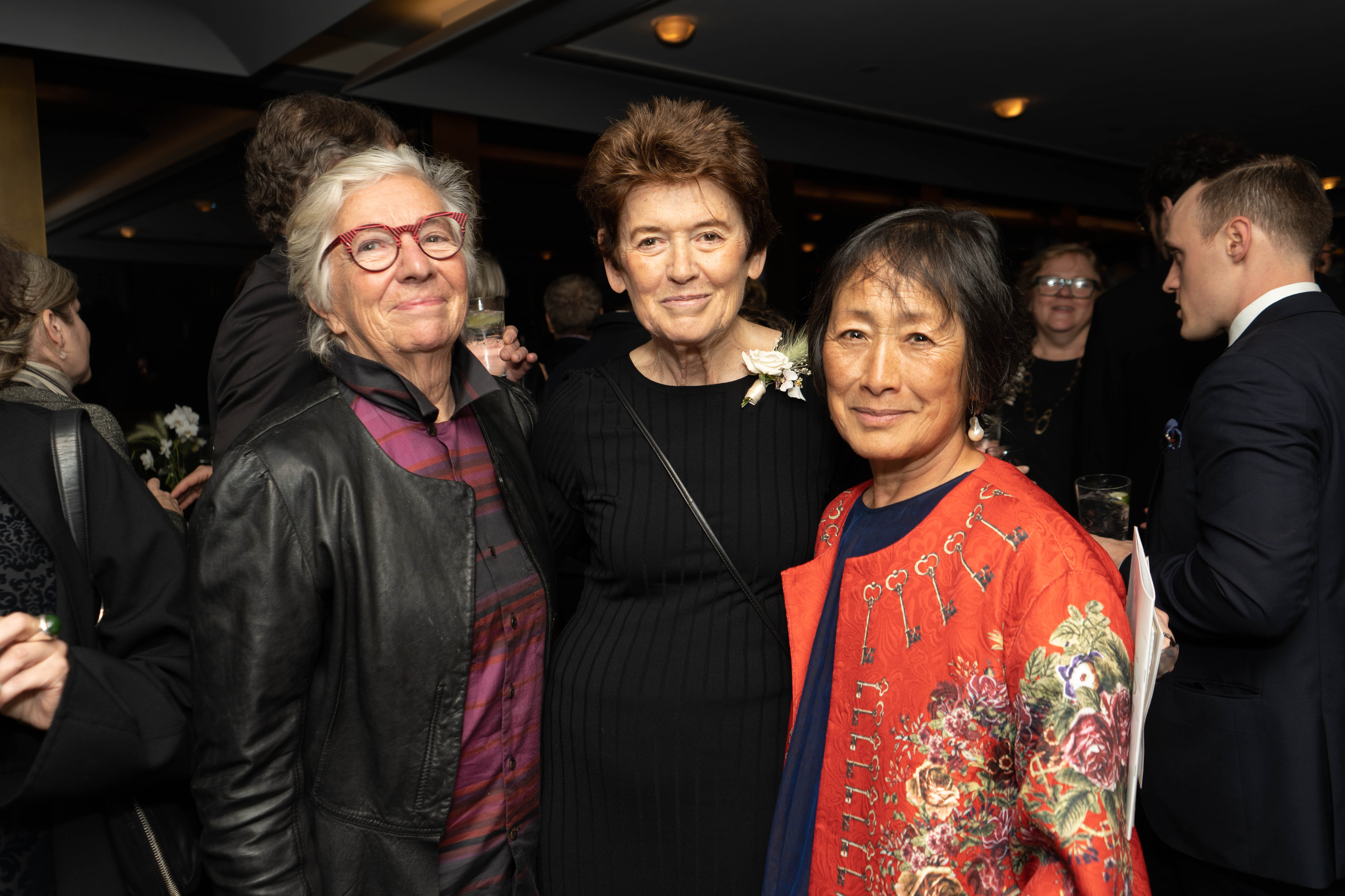 Judy Pfaff, Ursula von Rydingsvard, and Billie Tsien pose for a photograph during cocktail hour.