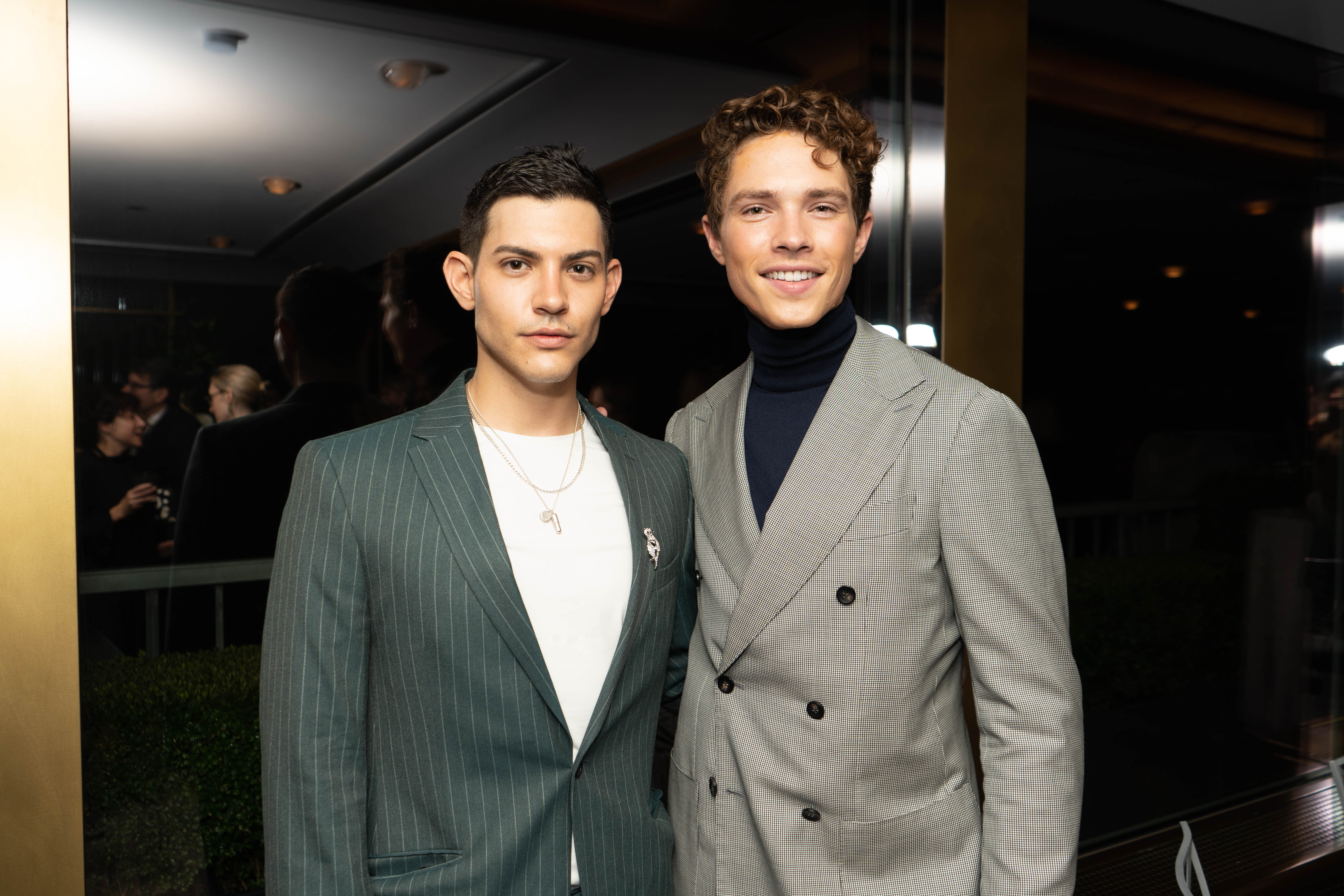 Nick Hissom and Kameron Ramirez pose for a photograph during cocktail hour.