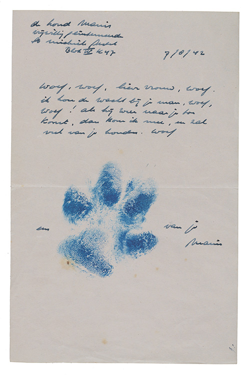 Letter with dog pawprint in ink.