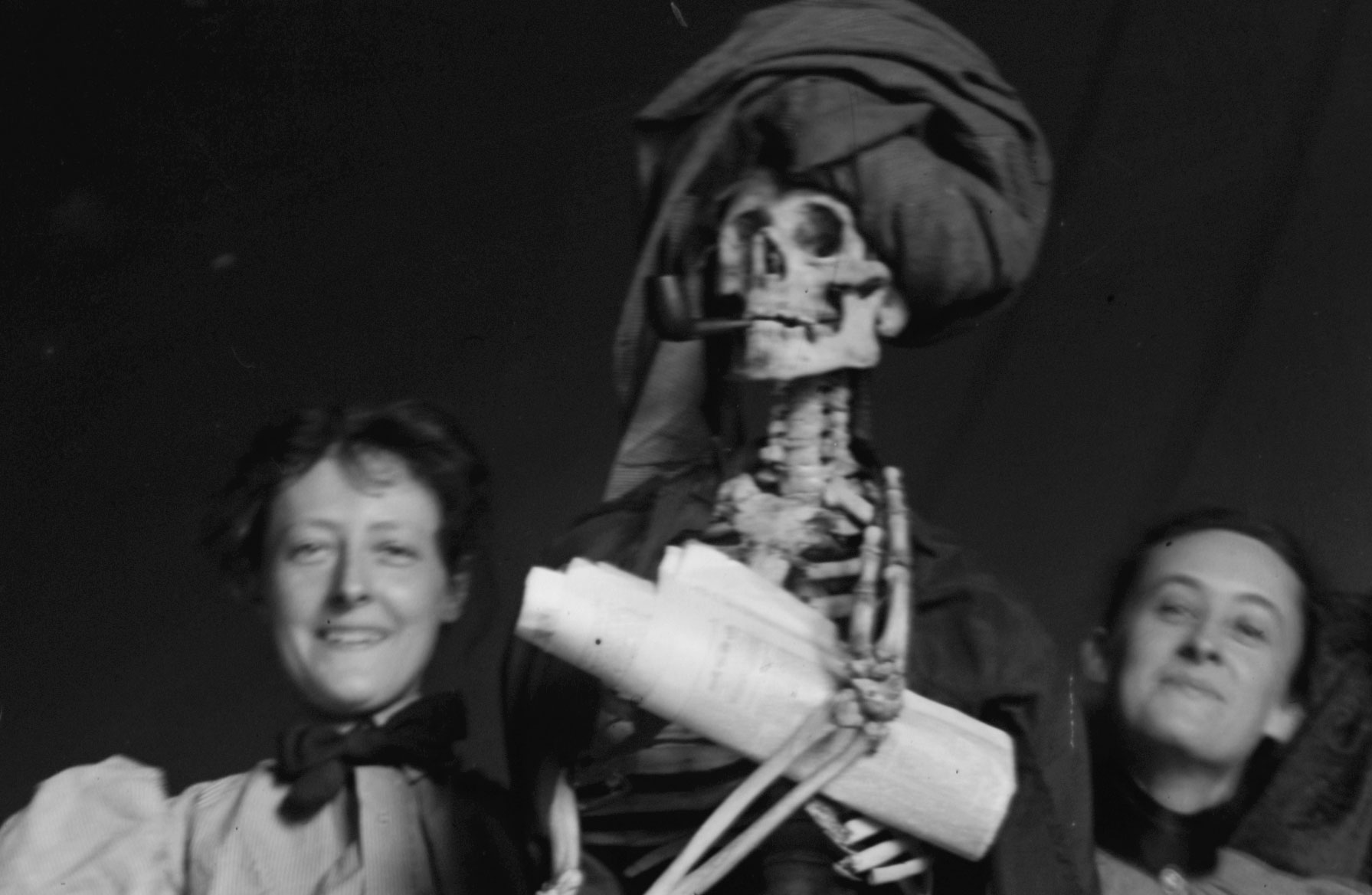 Art class posing with a skeleton