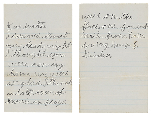 Letter written in pencil and cursive text by a child on blue lined paper.