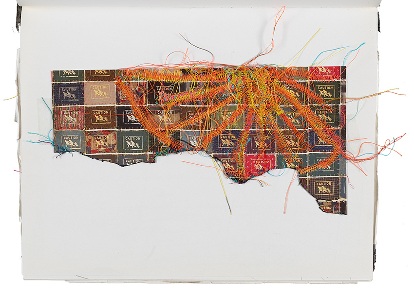 Detail of artwork with wayfinder symbol of family running with the word caution and machine stitching in various colors.