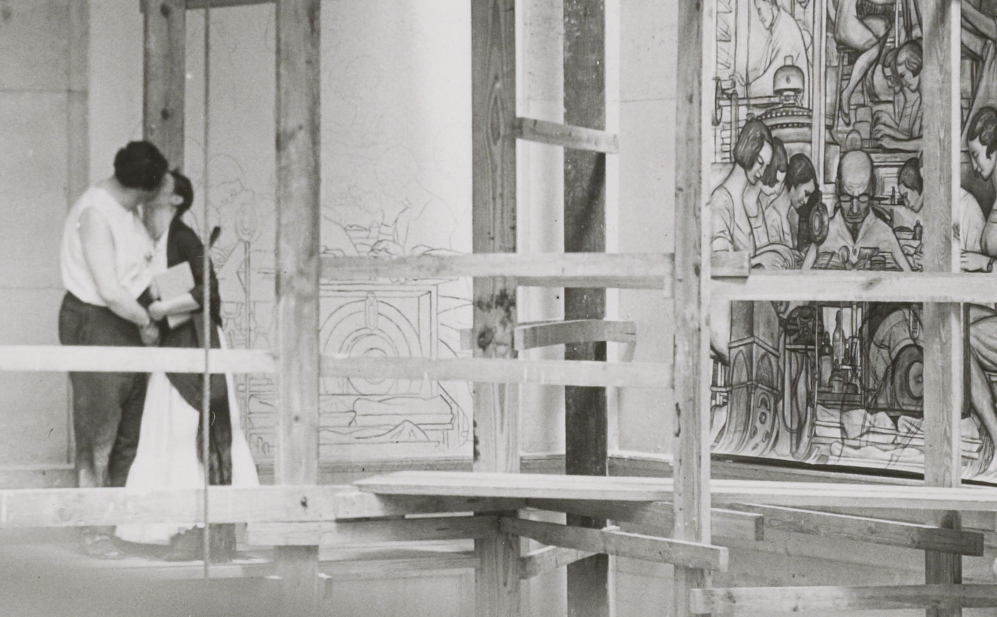 Diego Rivera and Frida Kahlo photographed while kissing at the Detroit Institute of Arts