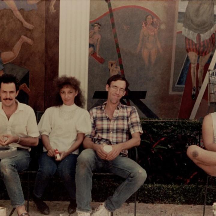 Artists in front of the mural, The Great Theater of the World in the courtyard of the Norton Gallery of Art in West Palm Beach, 